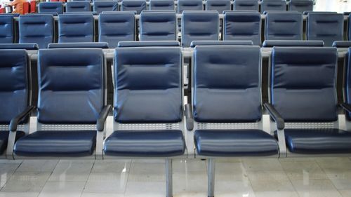 Empty chairs in airport