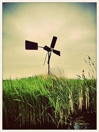 Wind turbines on field