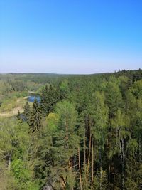 Scenic view of land against clear blue sky