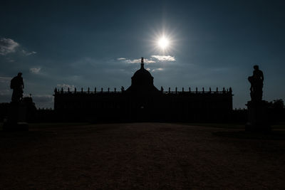 View of built structures at sunset