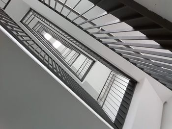 Low angle view of spiral staircase in building