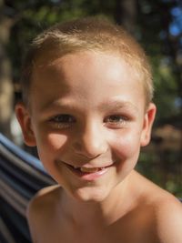 Close-up portrait of smiling boy