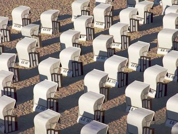 Full frame shot of hooded beach chairs