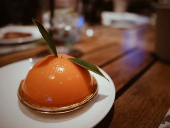 Close-up of fruit in plate on table