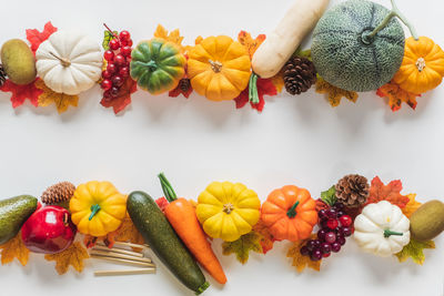 Close-up of fruits against white background