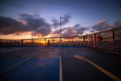 Road against sky during sunset