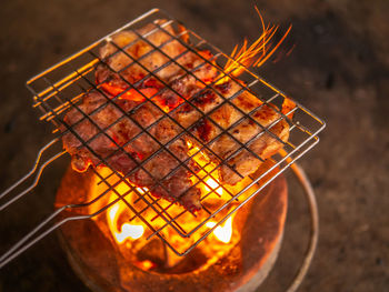 Close-up of fire on barbecue grill