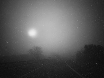 Scenic view of landscape against sky at night