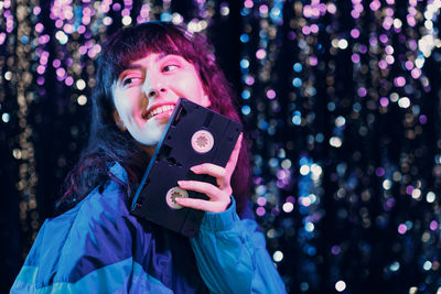 Young woman using mobile phone