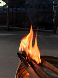 Close-up of burning fire at night