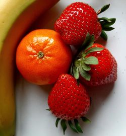 High angle view of strawberries on table