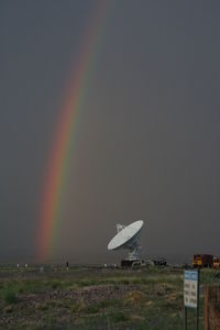 Scenic view of rainbow against sky during sunset