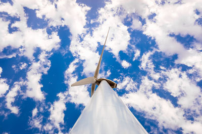 Low angle view of wind turbine against sky