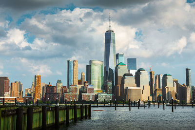 Panoramic view of modern buildings in city against sky