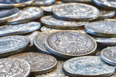 High angle view of coins on table