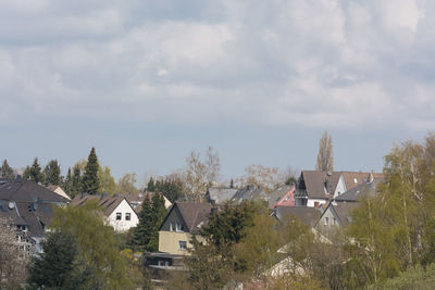 High angle view of houses and buildings in town