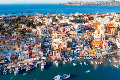 High angle view of cityscape by sea