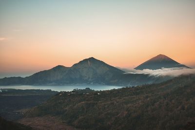 Scenic view of mountains against sky during sunset