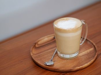 Close-up of cappuccino on table