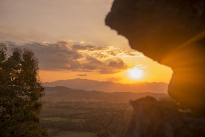 Scenic view of mountains against sky during sunset