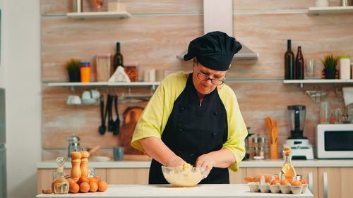 Man preparing food in kitchen