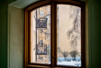 Reflection of building on window