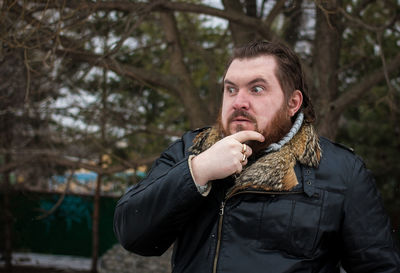 Man standing outdoors during winter