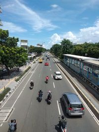 High angle view of vehicles on road in city