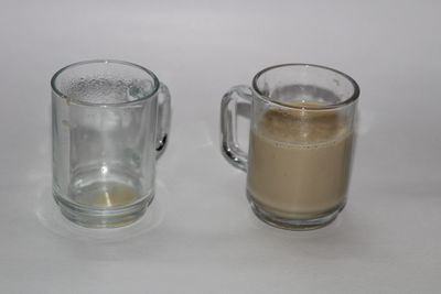 Close-up of drink against white background