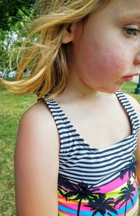 Close-up of girl wearing hat