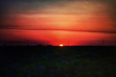 Scenic view of landscape at sunset
