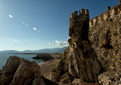 Panoramic view of rock formation against sky