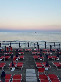 Scenic view of sea against clear sky during sunset