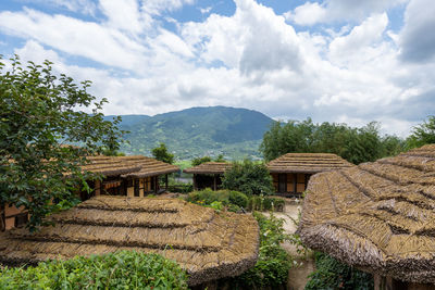 Panoramic view of agricultural landscape against sky