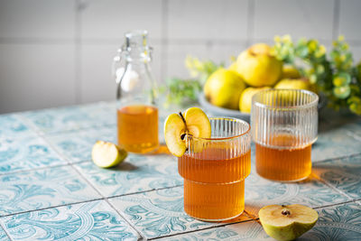 Close-up of juice and drink on table