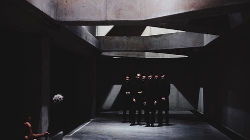 People in corridor of building