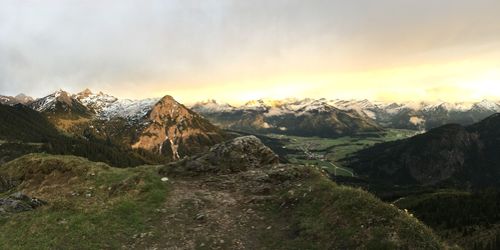 Scenic view of mountains against sky during sunset