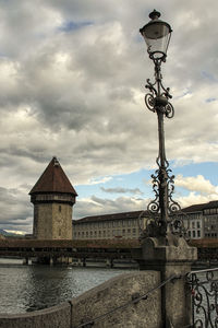 Low angle view of building against cloudy sky