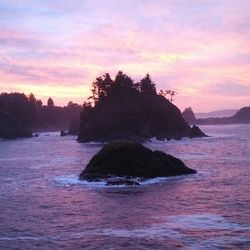 Scenic view of sea at sunset