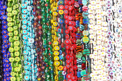 Full frame shot of colorful beads for sale in market