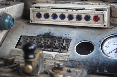 Close-up of abandoned dashboard