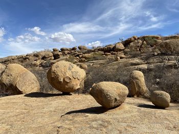 Rocks on shore against sky