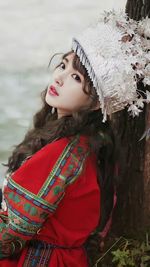 Portrait of young woman wearing hat