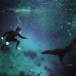 Man swimming in sea