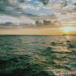 Scenic view of sea against dramatic sky