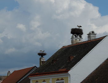 Low angle view of houses against sky