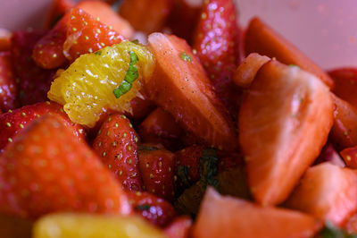 Close-up of chopped fruits in plate