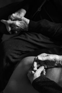 High angle view of man holding hands