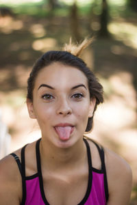 Close-up portrait of a smiling young woman