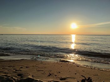 Scenic view of sea at sunset
